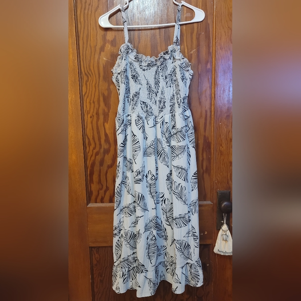 Light grey sundress with black feather designs